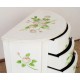 White commode with painted flowers